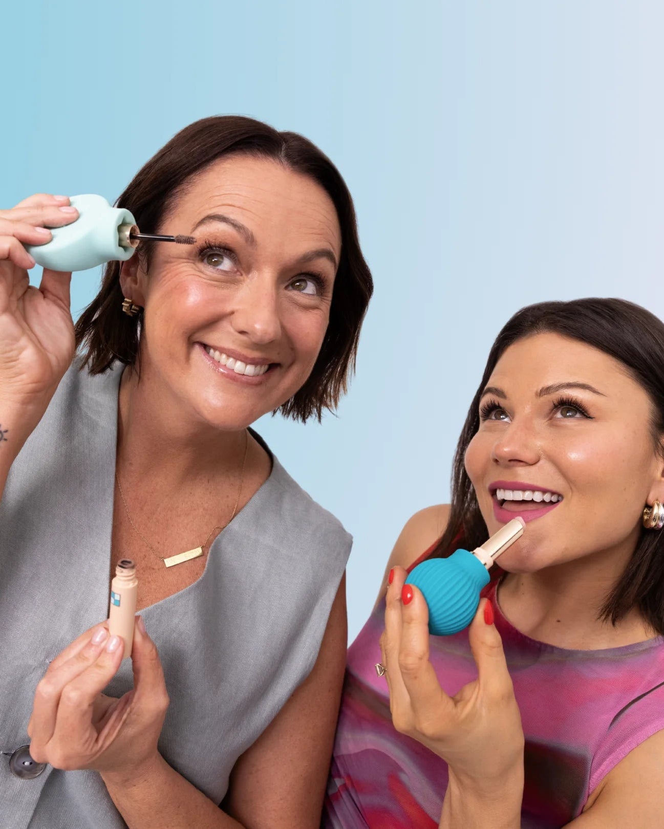 Two women, Celester Barber and Storm Menzies, applying makeup using bystorm Xbooie adaptive beauty tools 